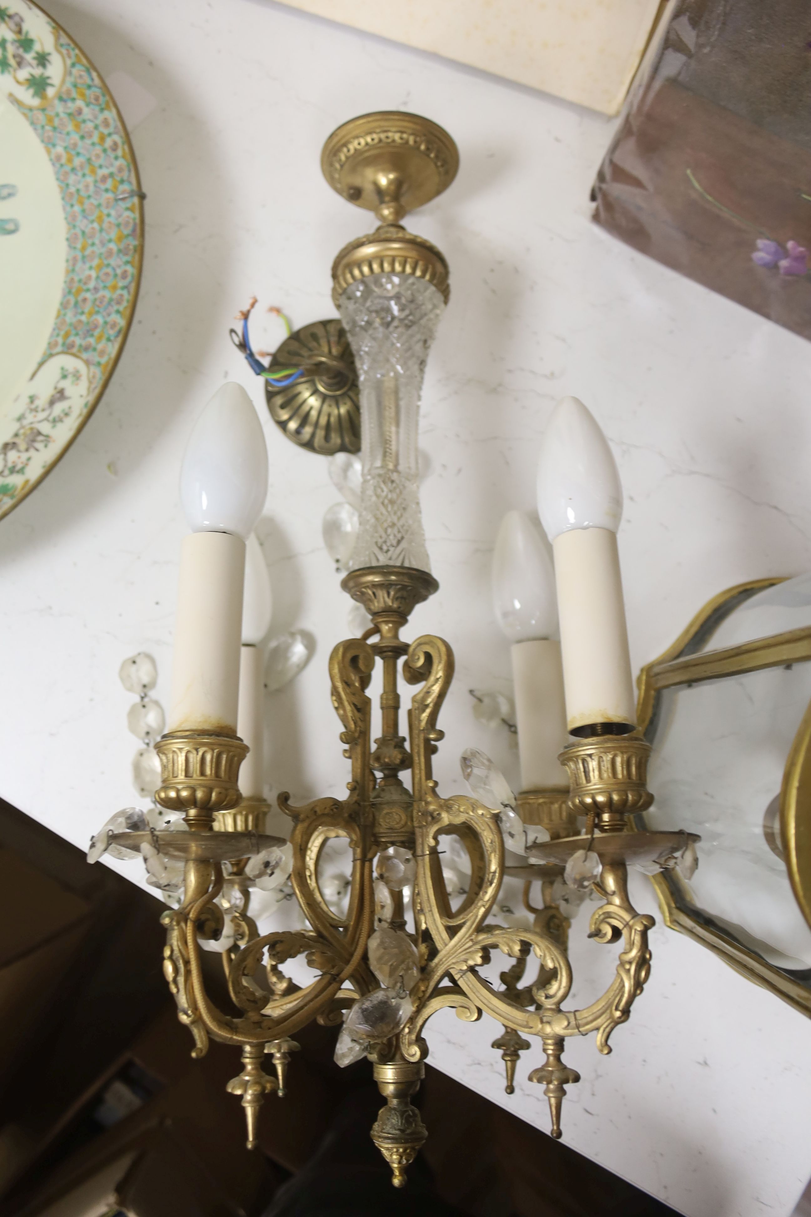 An early 20th century gilt brass hall lantern, height 49cm, and a gilt metal lustre hung electrolier